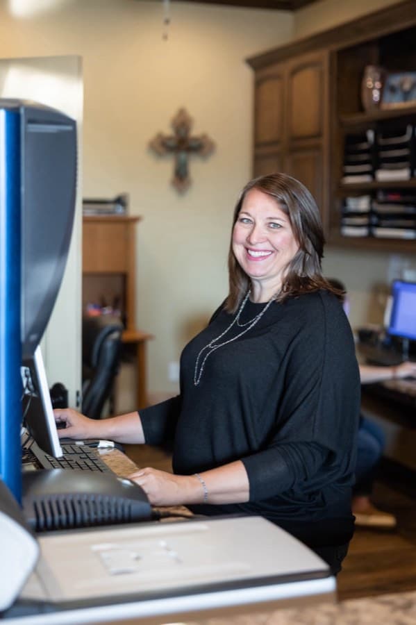 Jennifer at her desk at Newcastle Tag Agency